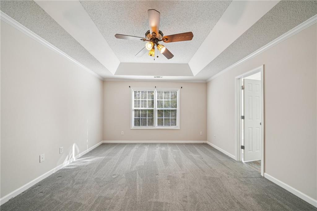 480 Raider Way Bethlehem, GA 30620 - Photo 10 of 30 a view of an empty room with a window
