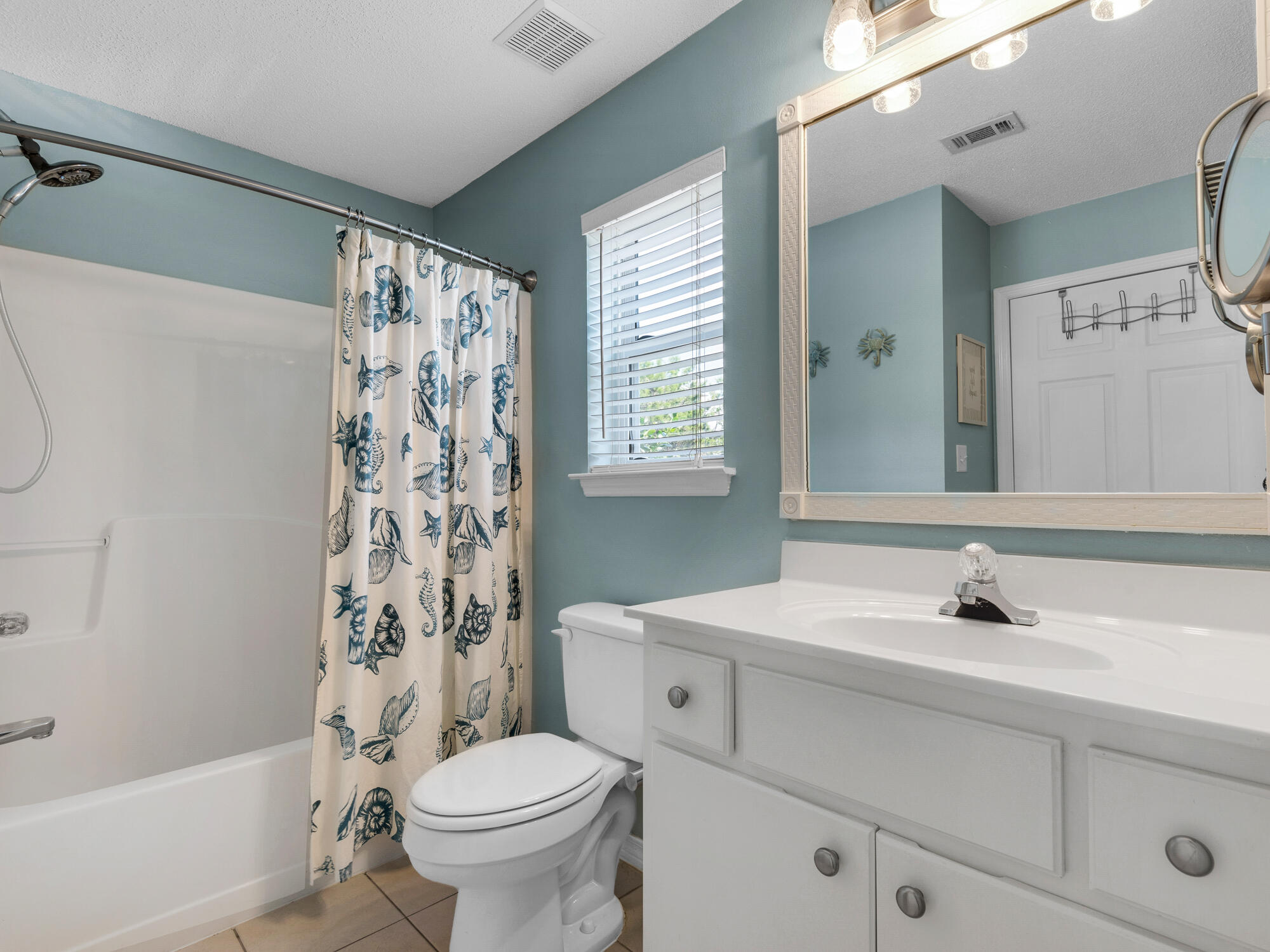 82 Sugar Sand Lane, Unit C2 Santa Rosa Beach, FL 32459 - Photo 17 of 34 a bathroom with a sink toilet and shower