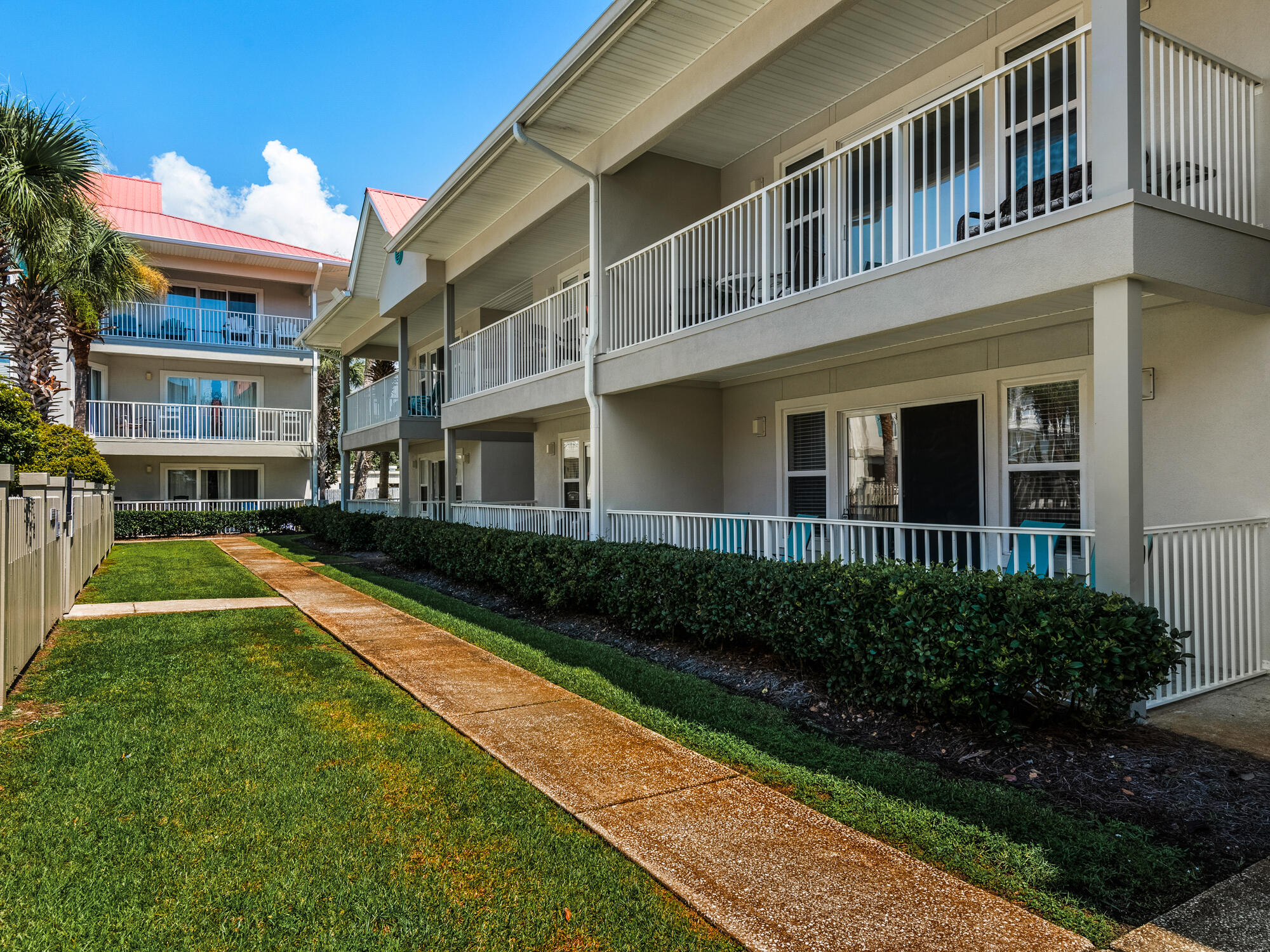 82 Sugar Sand Lane, Unit C2 Santa Rosa Beach, FL 32459 - Photo 21 of 34 a house view with a garden space
