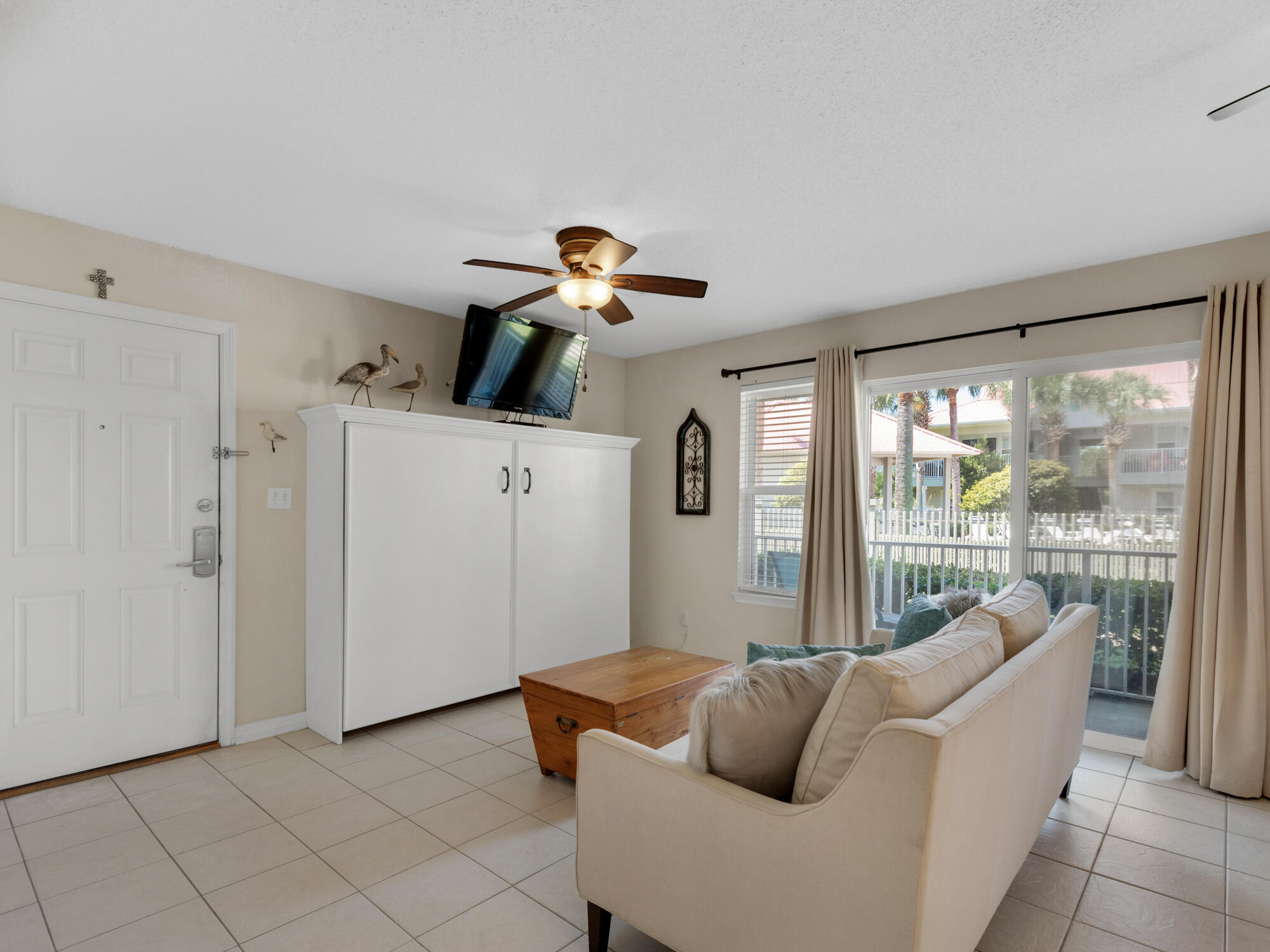 82 Sugar Sand Lane, Unit C2 Santa Rosa Beach, FL 32459 - Photo 5 of 34 a living room with furniture and a window