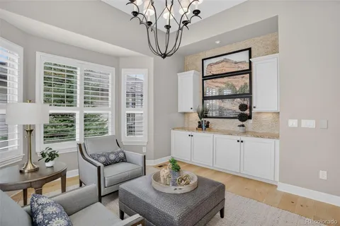 a living room with furniture and window
