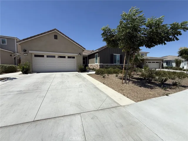 a house view with a outdoor space