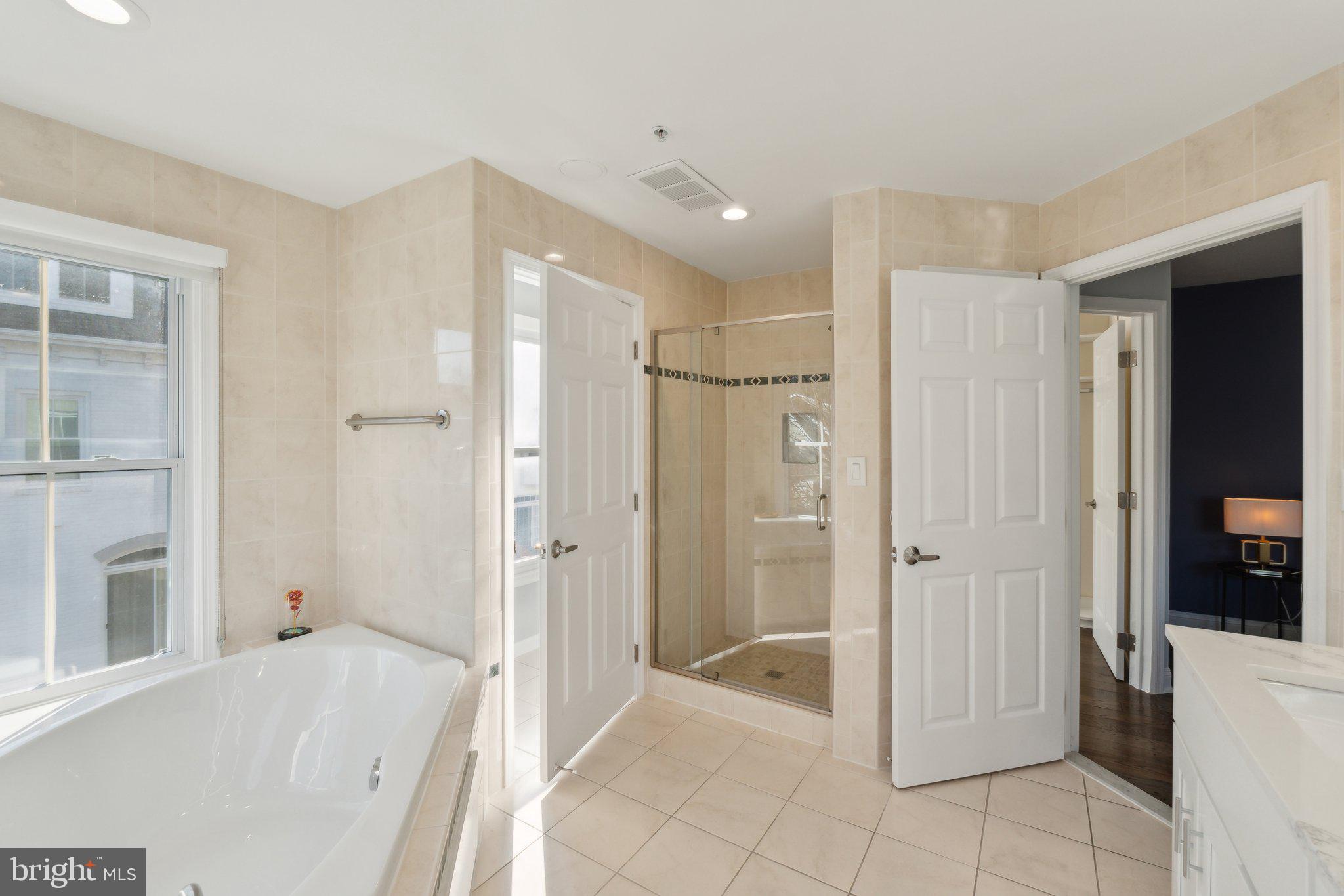 5334 43rd Street Northwest Washington, DC 20015 - Photo 16 of 32 a bathroom with a shower and a tub