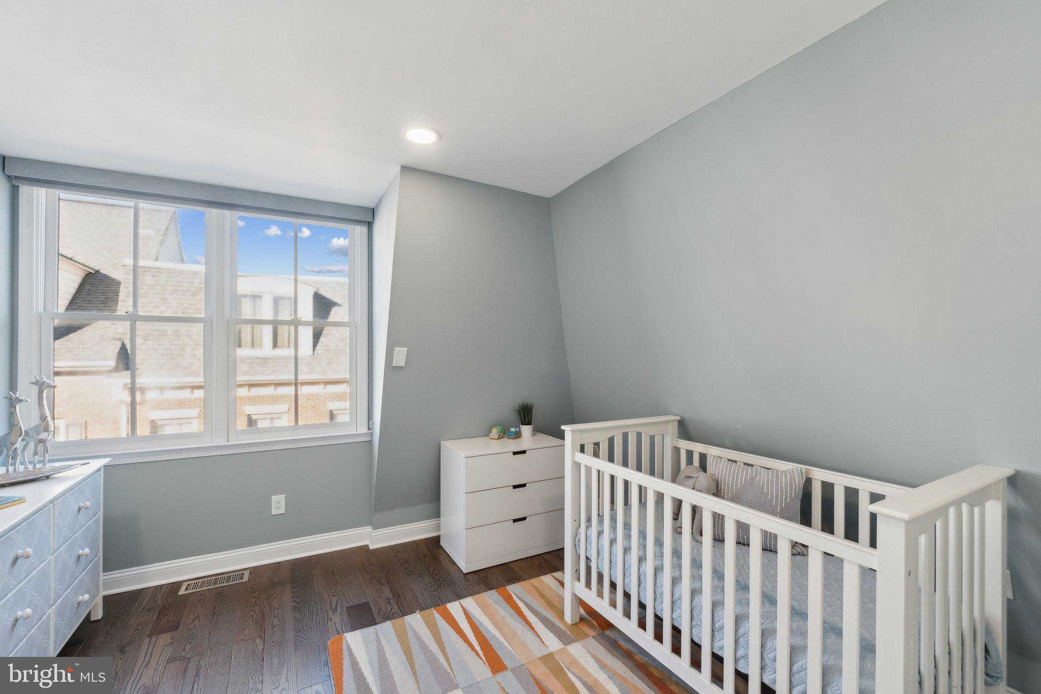 5334 43rd Street Northwest Washington, DC 20015 - Photo 23 of 32 a bedroom with furniture and a window