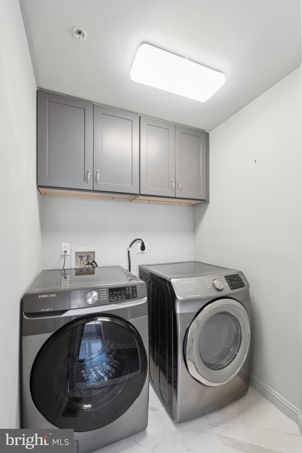 5334 43rd Street Northwest Washington, DC 20015 - Photo 26 of 32 a utility room with a sink dryer and washer