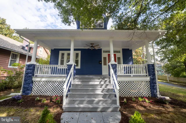 front view of a house with a deck