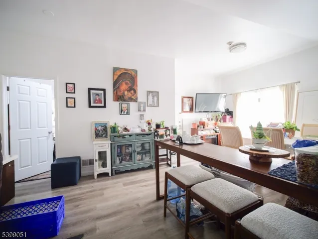 a kitchen with stainless steel appliances granite countertop a refrigerator and sink