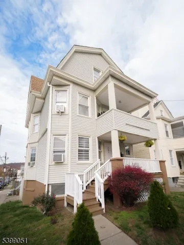 a view of a back yard of the house