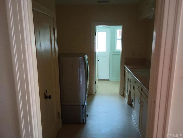 a view of hallway with stairs