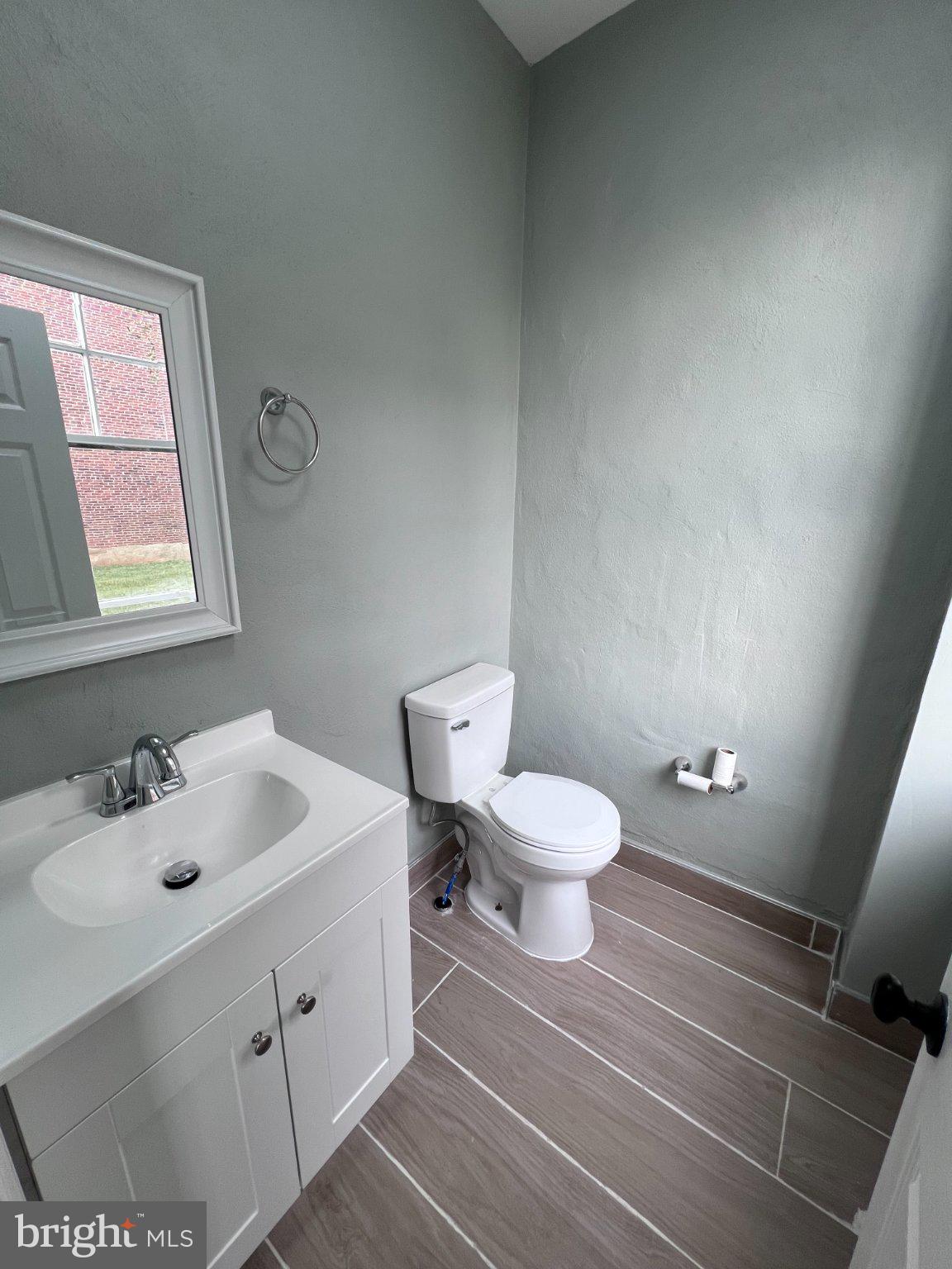 26 East 5th Street Pottstown, PA 19464 - Photo 13 of 37 a bathroom with a sink toilet and a window