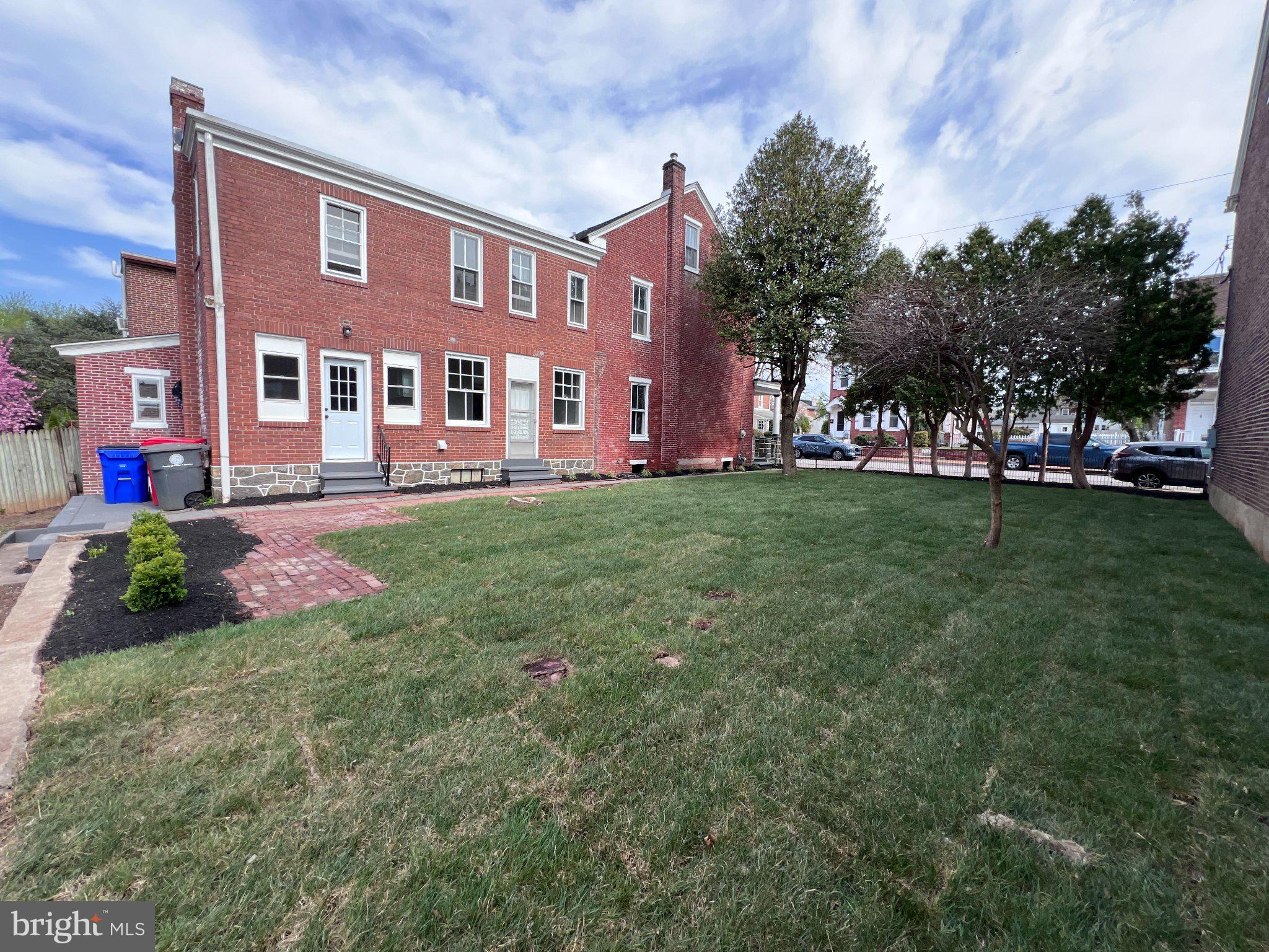 26 East 5th Street Pottstown, PA 19464 - Photo 7 of 37 a front view of a house with a garden