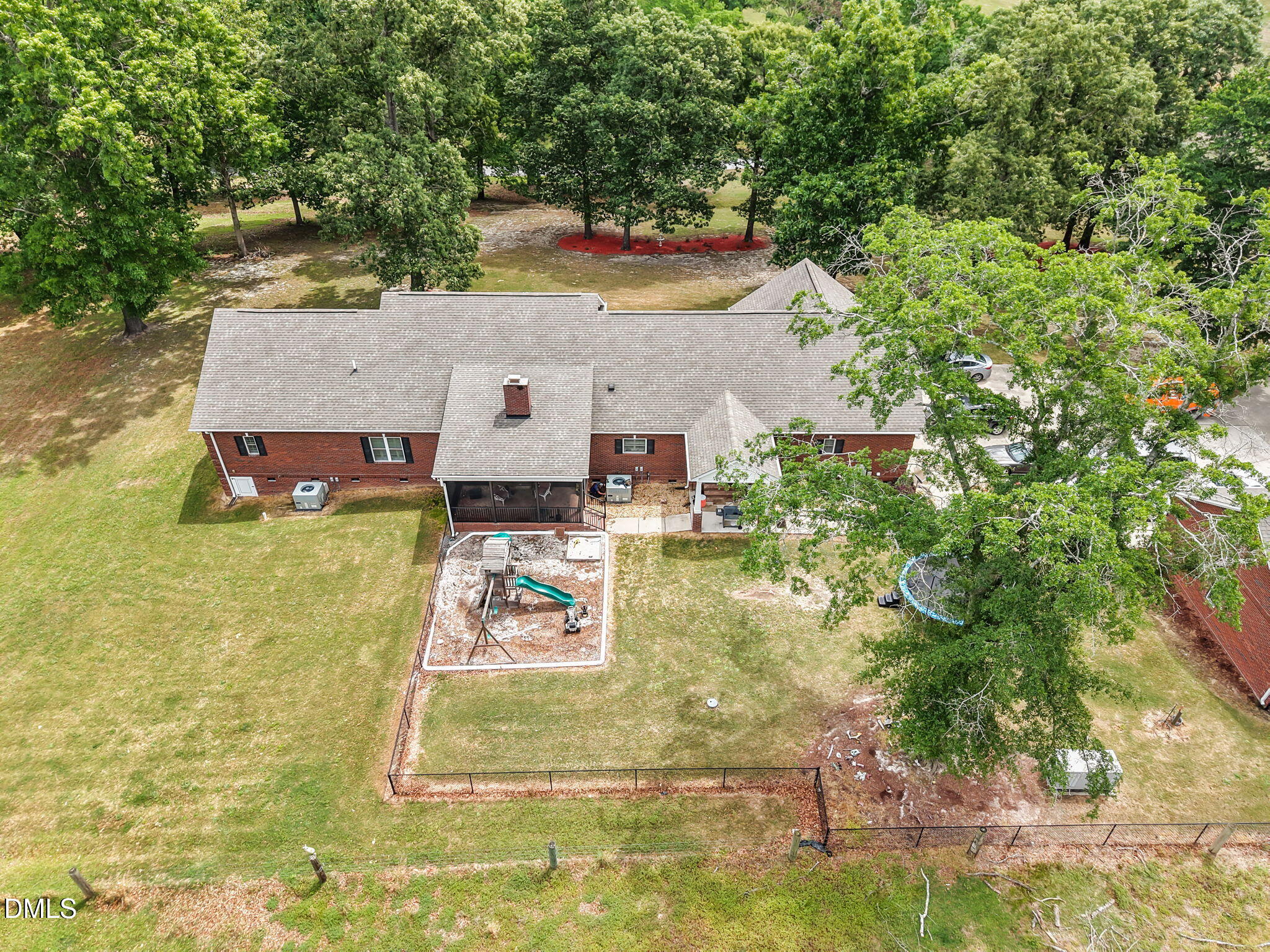 2880 Elevation Road Four Oaks, NC 27524 - Photo 43 of 51 a aerial view of a house with swimming pool