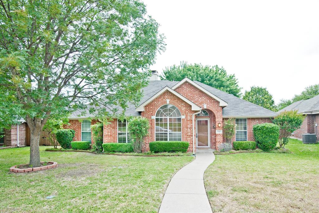 7757 Lancelot Road Frisco, TX 75035 - Photo 1 of 27 View of front of property with central AC unit, brick siding, and roof with shingles