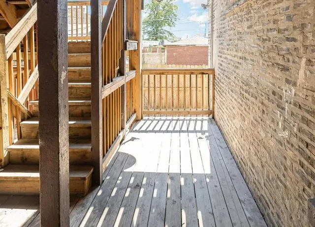 a view of a park with large trees