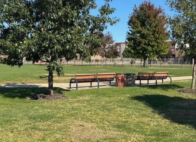 a view of a park and trees
