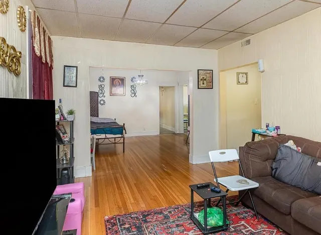 a view of balcony with wooden floor