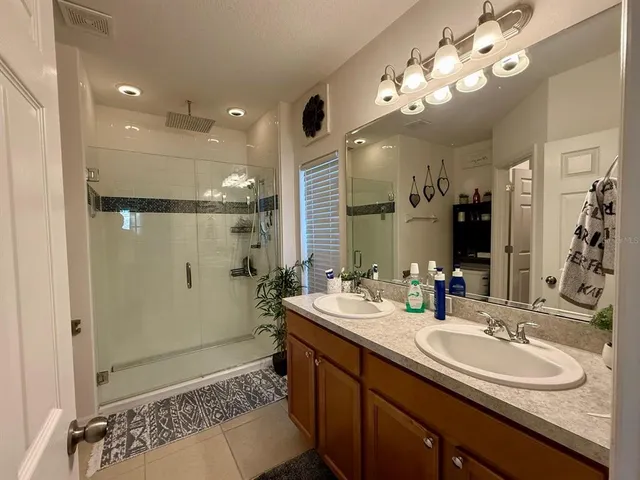 a bathroom with a shower and a toilet