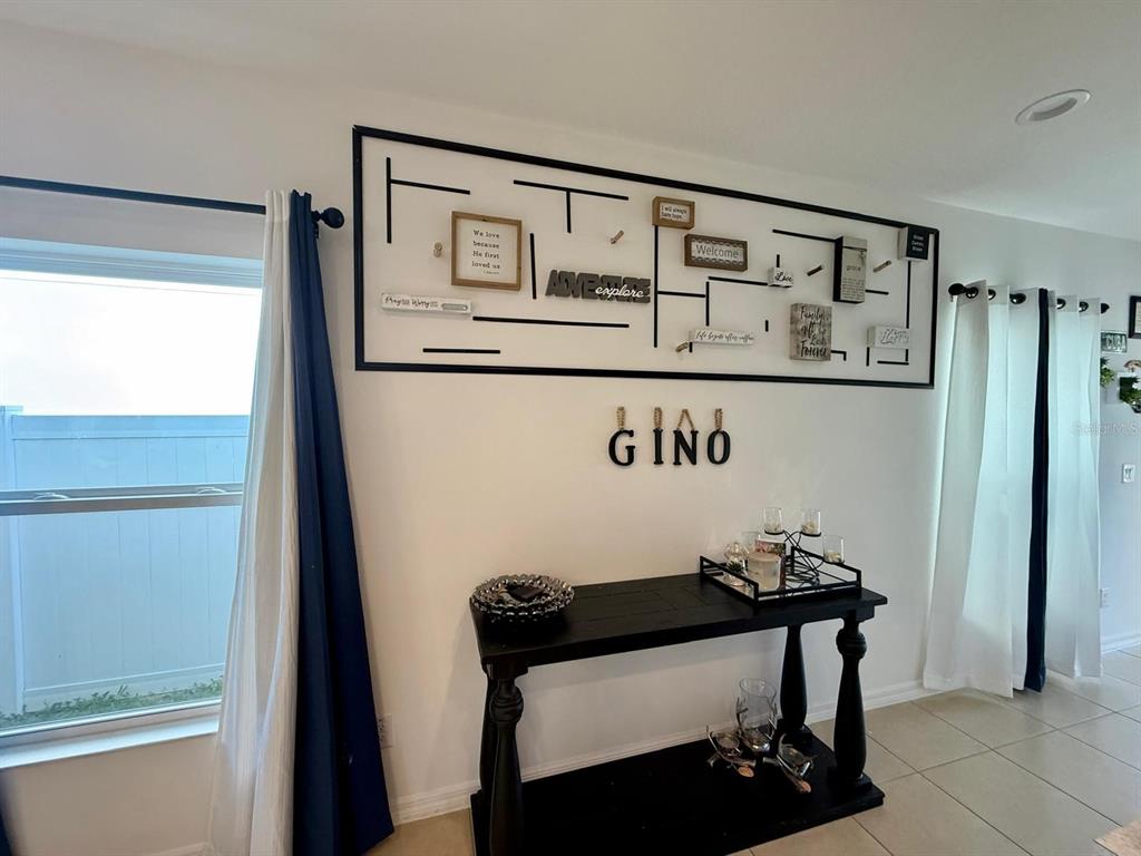 813 Marcel Loop Davenport, FL 33837 - Photo 4 of 34 a view of washer and dryer