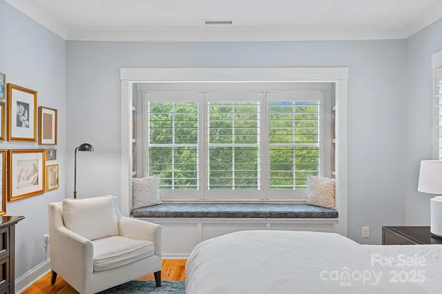 a bathroom with a granite countertop sink mirror and double