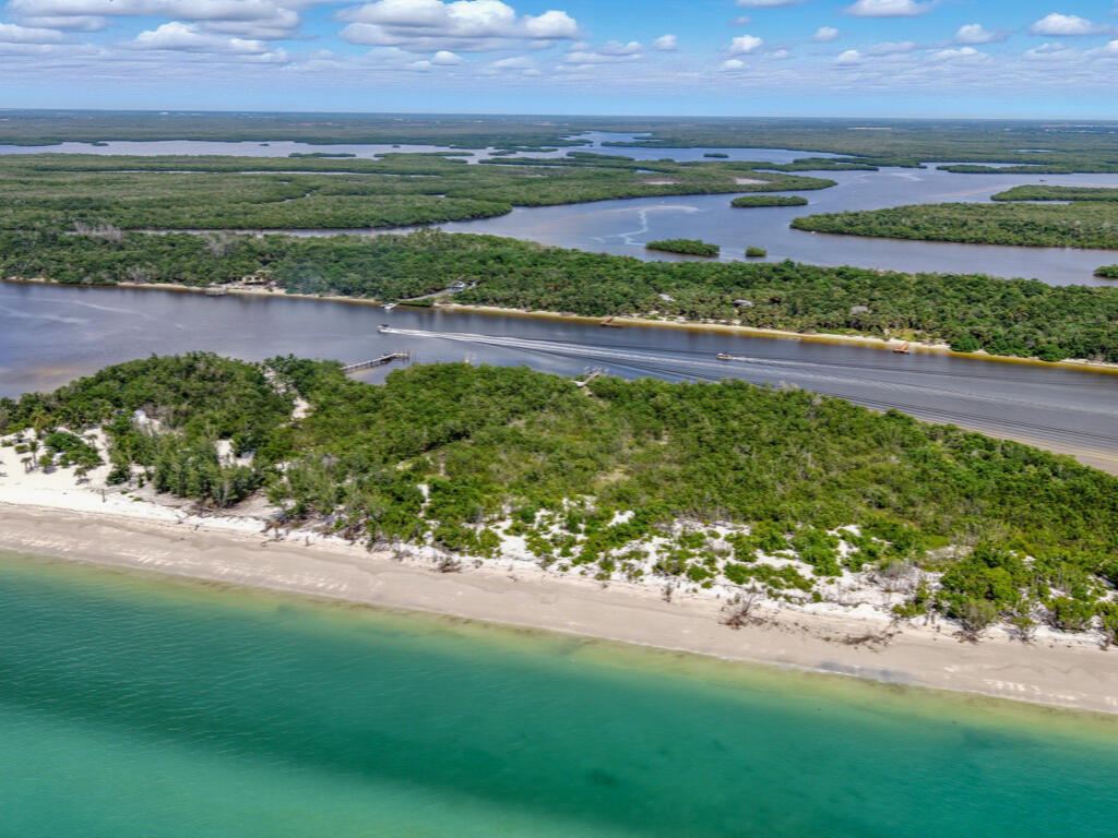 11799 Keewaydin Naples, FL 34113 - Photo 15 of 18 a view of a yard with an outdoor space