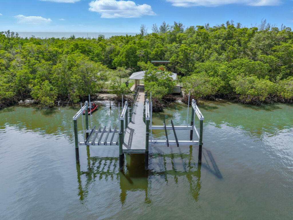 11799 Keewaydin Naples, FL 34113 - Photo 7 of 18 an outdoor view of garden with patio