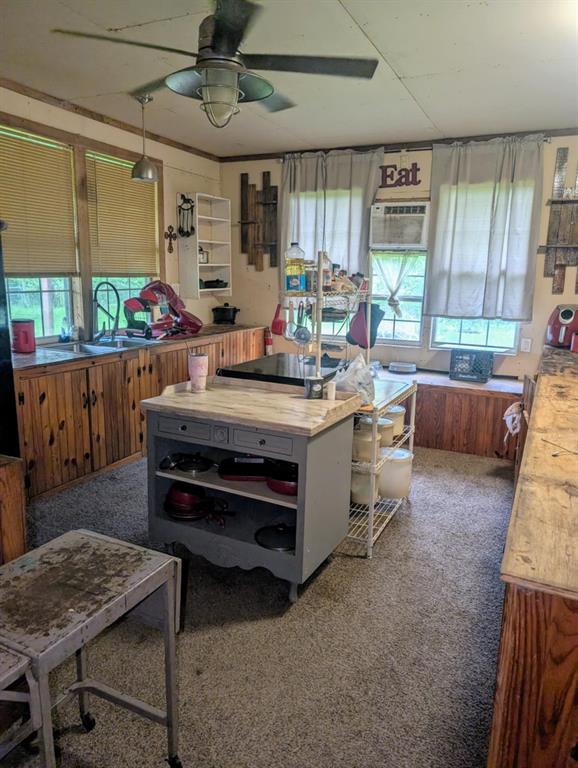 400 County Road 2815 Mabank, TX 75147 - Photo 4 of 18 a room with furniture a window and a table