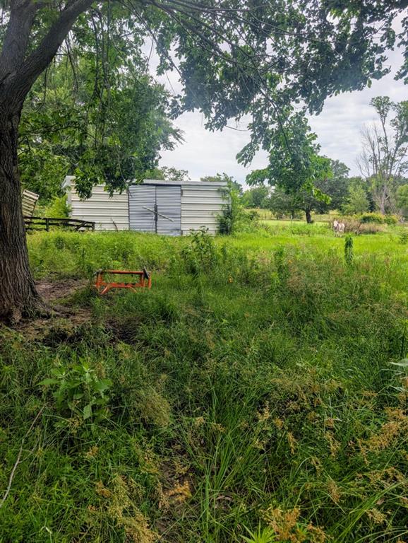 400 County Road 2815 Mabank, TX 75147 - Photo 9 of 18 a view of outdoor space with deck and green space