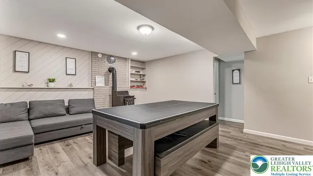 a kitchen with a stove and a refrigerator