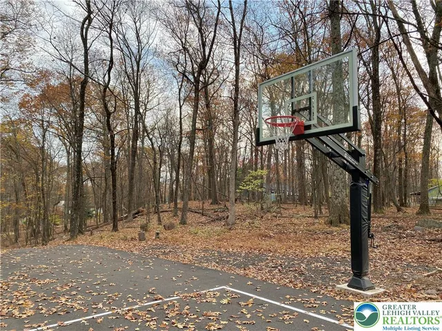 a view of a table and chairs in the garden