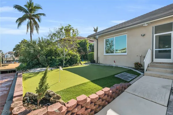 a view of a house with swimming pool