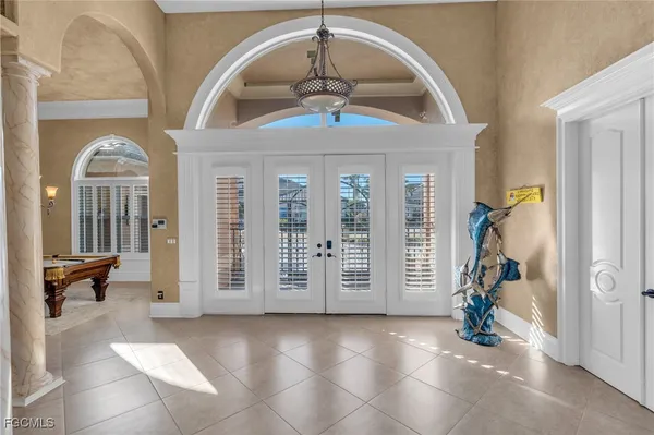 a view of a hallway with windows