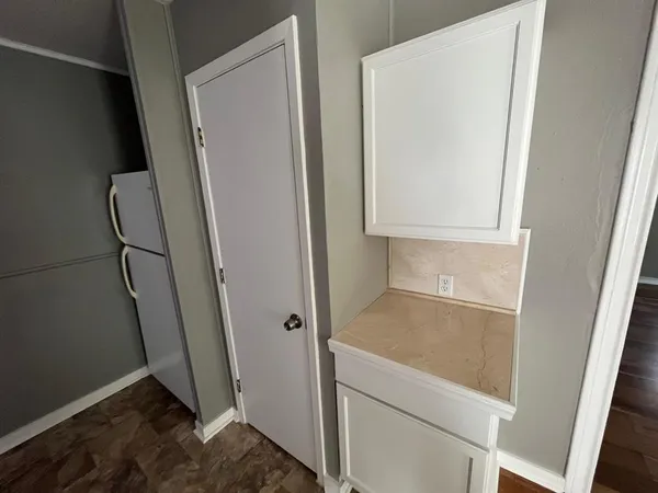 a bathroom with a sink and washing machine