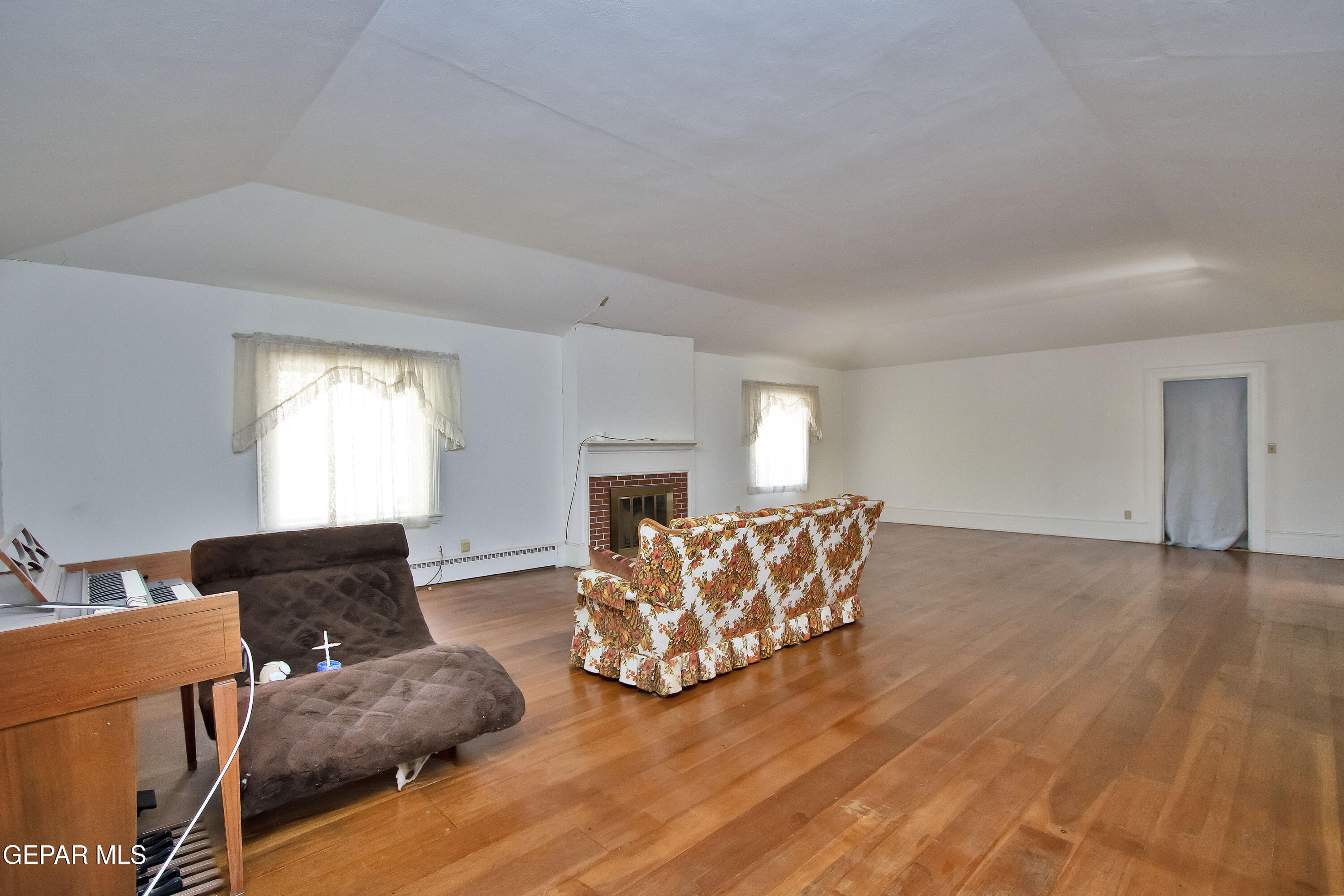 110 Southwest Creosote Road Out Of Service Area, OUT OF SERVICE AREA 99999 - Photo 14 of 101 a living room with furniture window and a fireplace