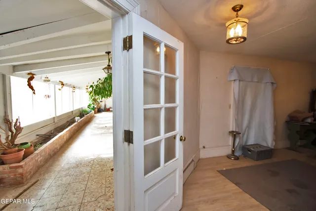 a bathroom with a sink a mirror and a shower