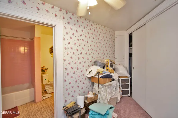 a living room with furniture window and a wooden floor