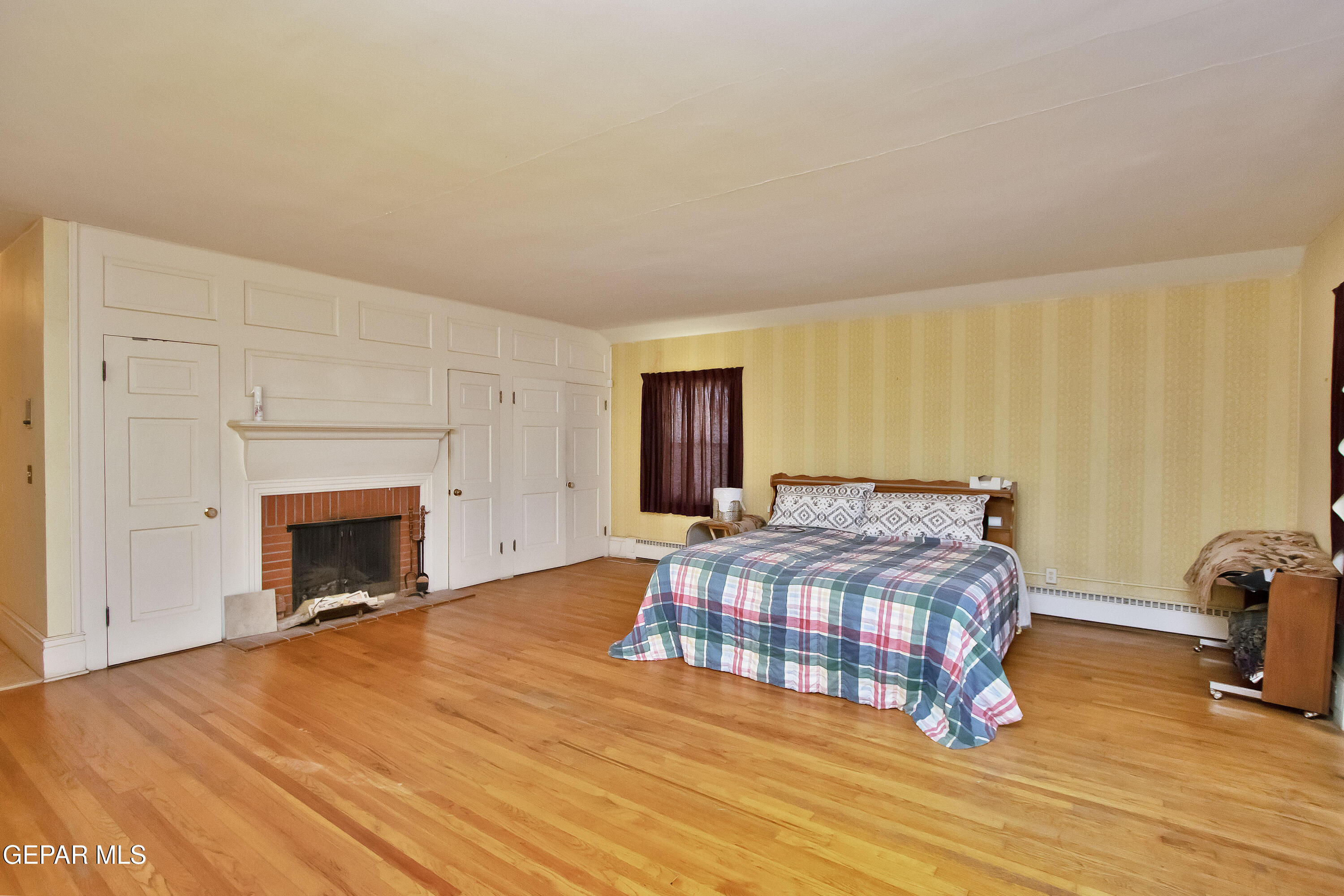 110 Southwest Creosote Road Out Of Service Area, OUT OF SERVICE AREA 99999 - Photo 37 of 101 a bedroom with a bed and a fireplace