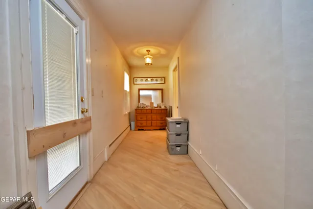 a view of a yard with a tree