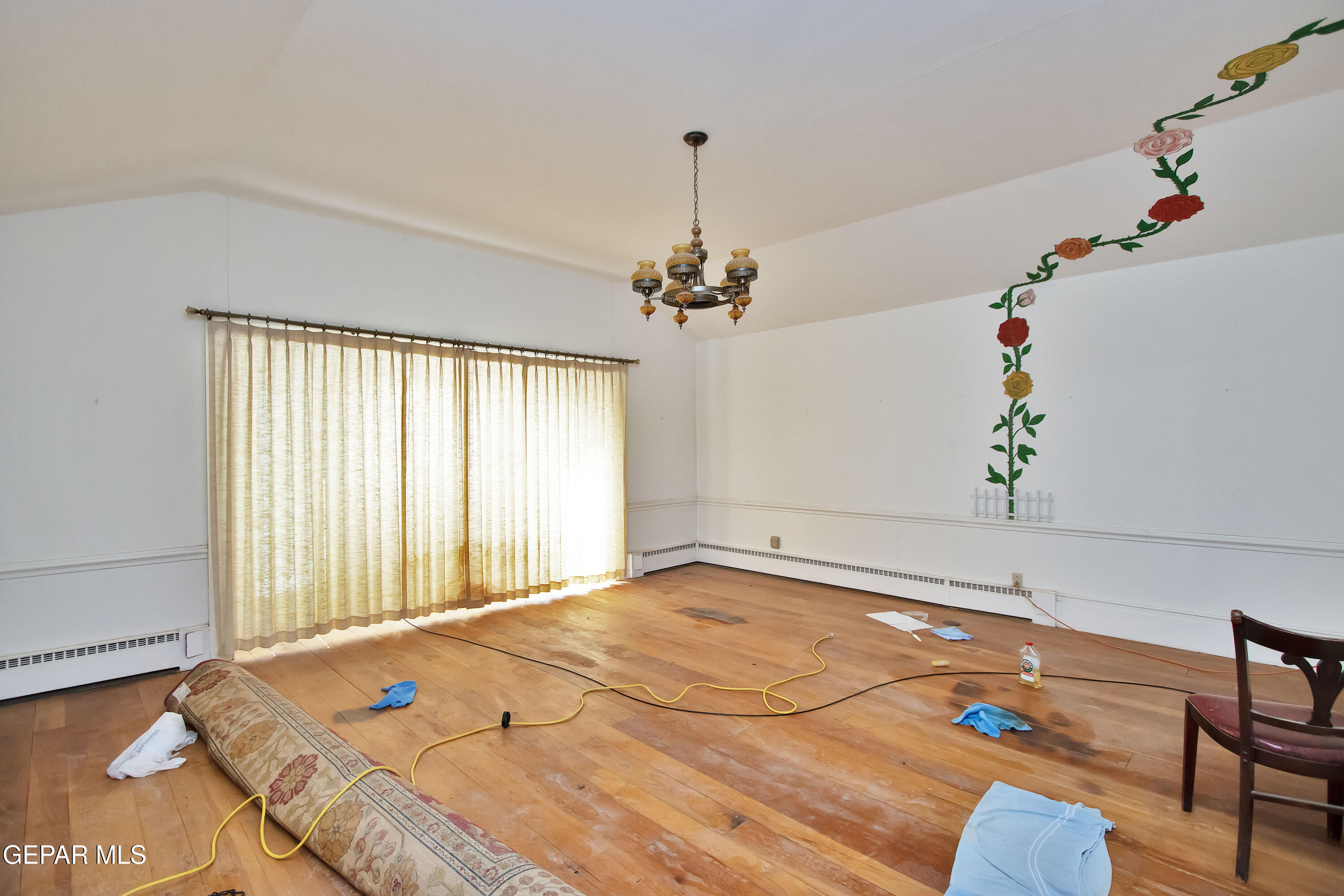 110 Southwest Creosote Road Out Of Service Area, OUT OF SERVICE AREA 99999 - Photo 59 of 101 a bedroom with a bed and a chandelier