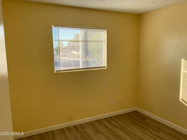 a view of a room that has a window
