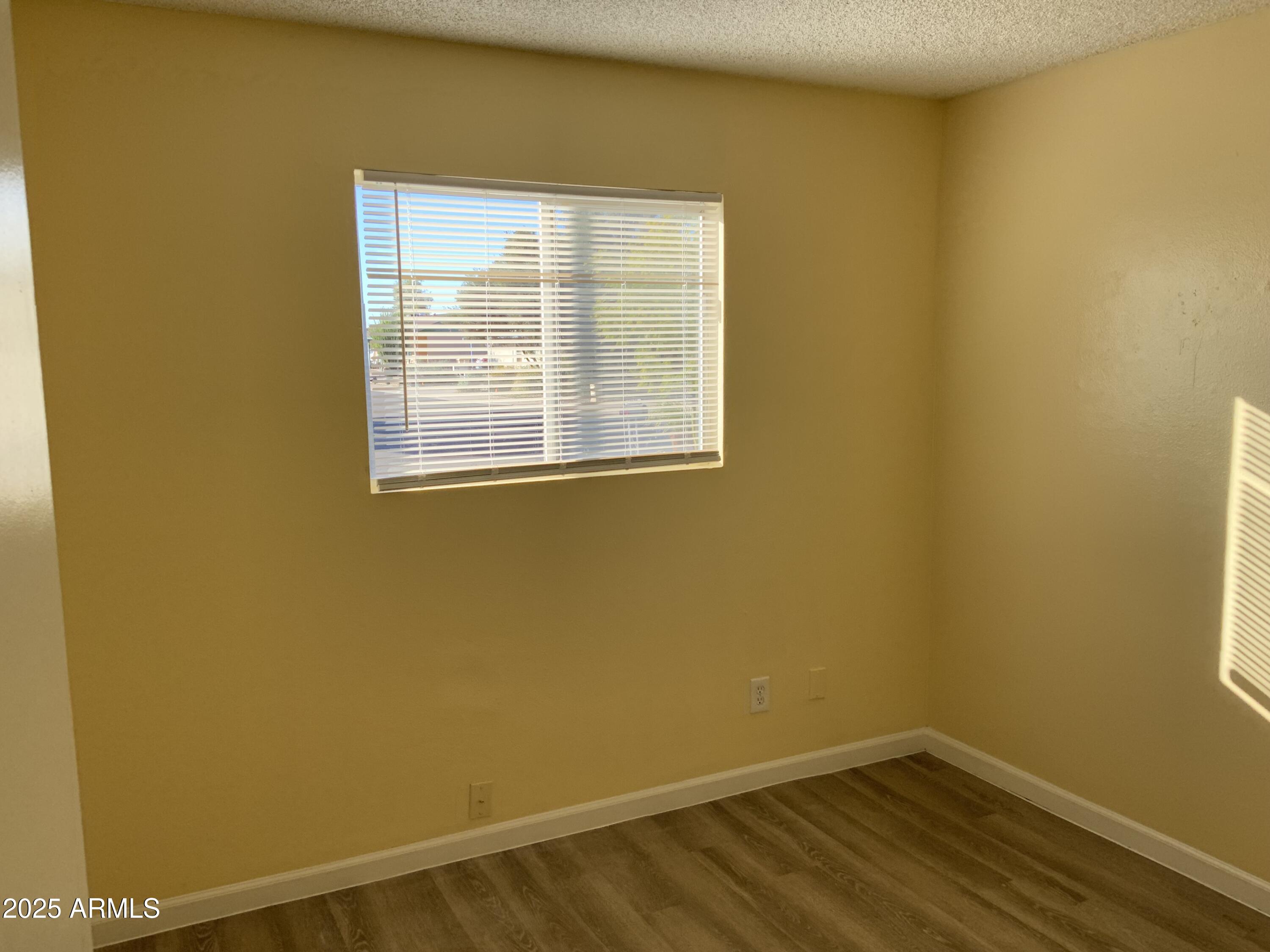 15831 North 59th Circle Glendale, AZ 85306 - Photo 7 of 12 a view of a room that has a window