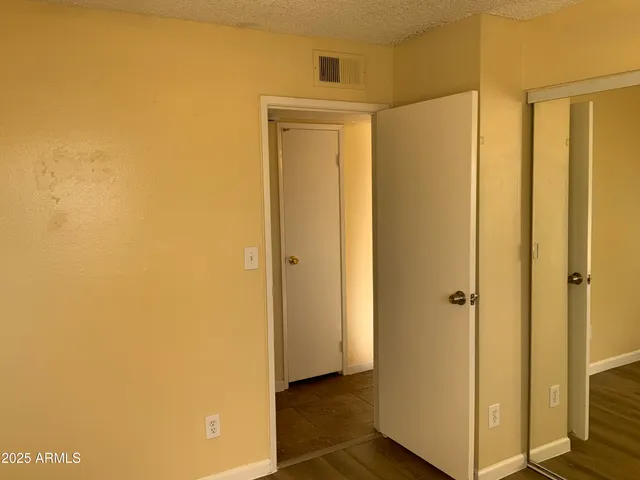 a view of a bathroom with a glass door
