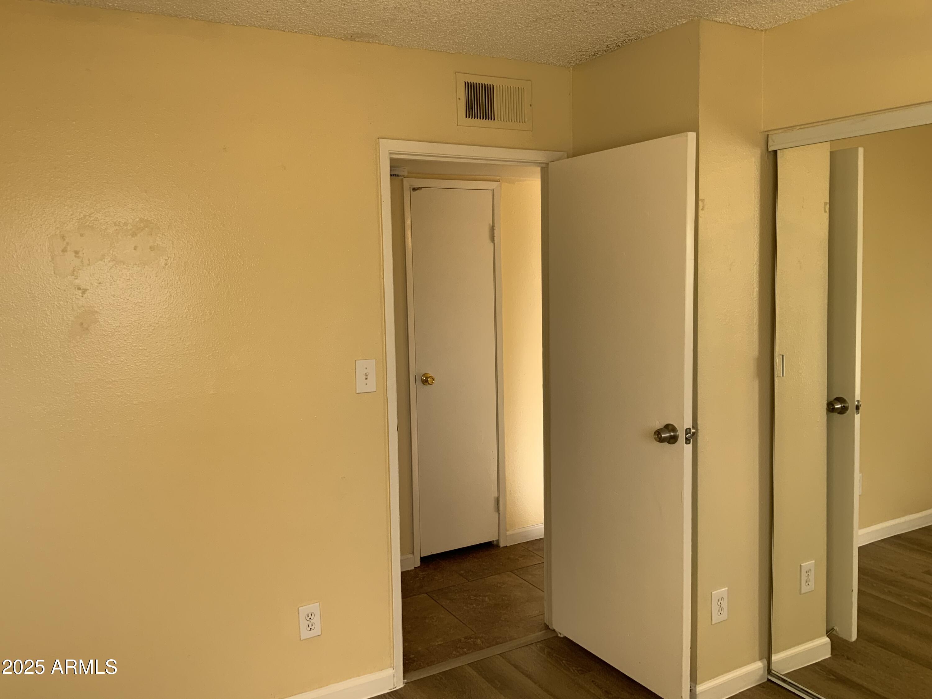 15831 North 59th Circle Glendale, AZ 85306 - Photo 9 of 12 a view of a bathroom with a glass door