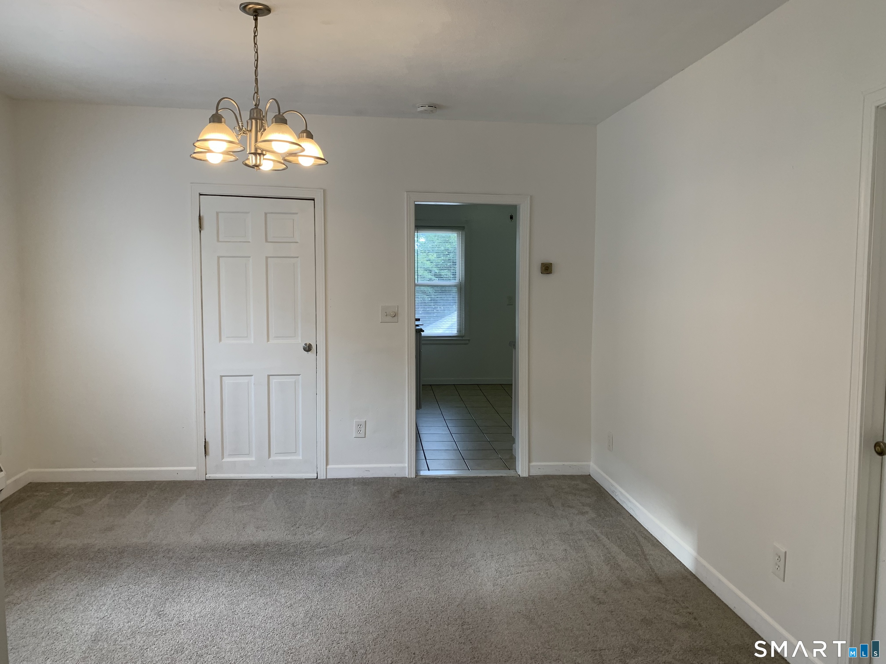 112 Austin Street New Britain, CT 06051 - Photo 12 of 40 a view of an empty room with a window