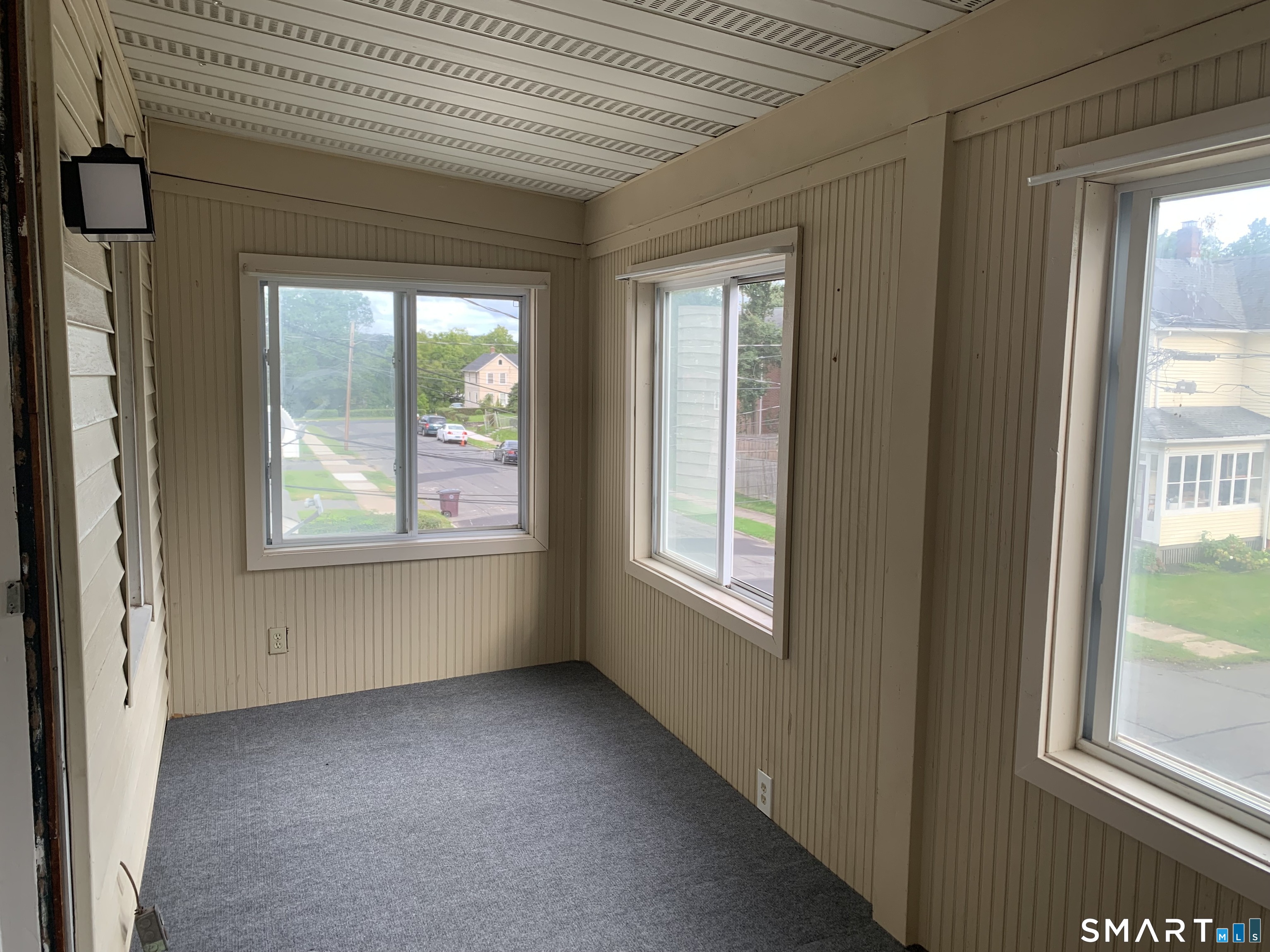 112 Austin Street New Britain, CT 06051 - Photo 14 of 40 a view of an empty room with a window