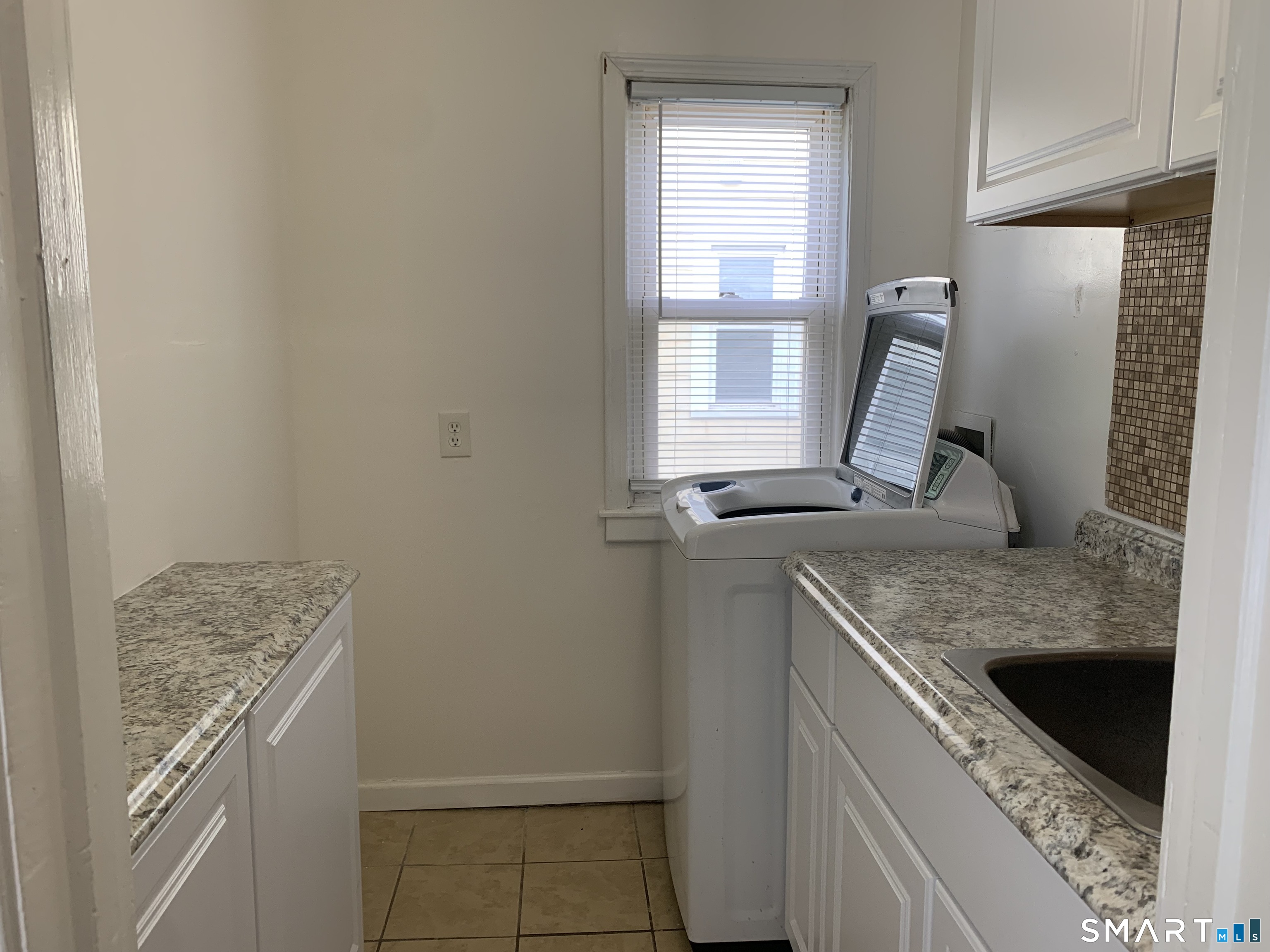 112 Austin Street New Britain, CT 06051 - Photo 18 of 40 a view of a kitchen with a sink