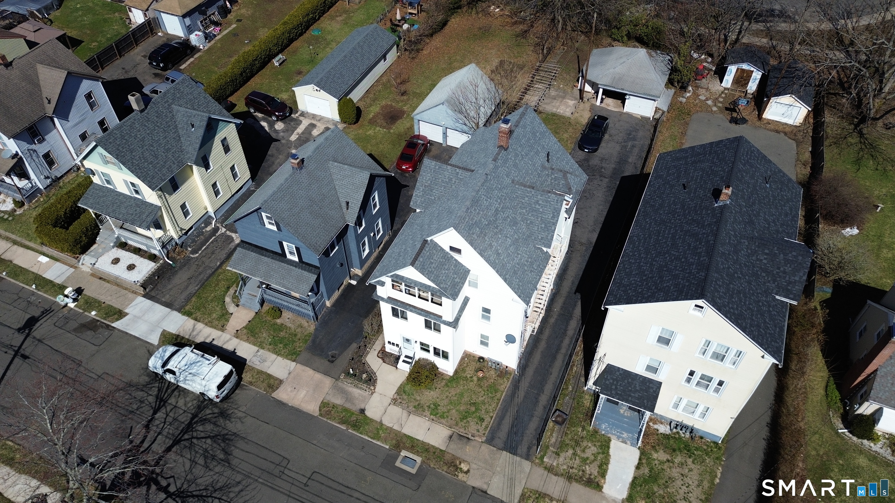 112 Austin Street New Britain, CT 06051 - Photo 39 of 40 an aerial view of a residential apartment building with a yard