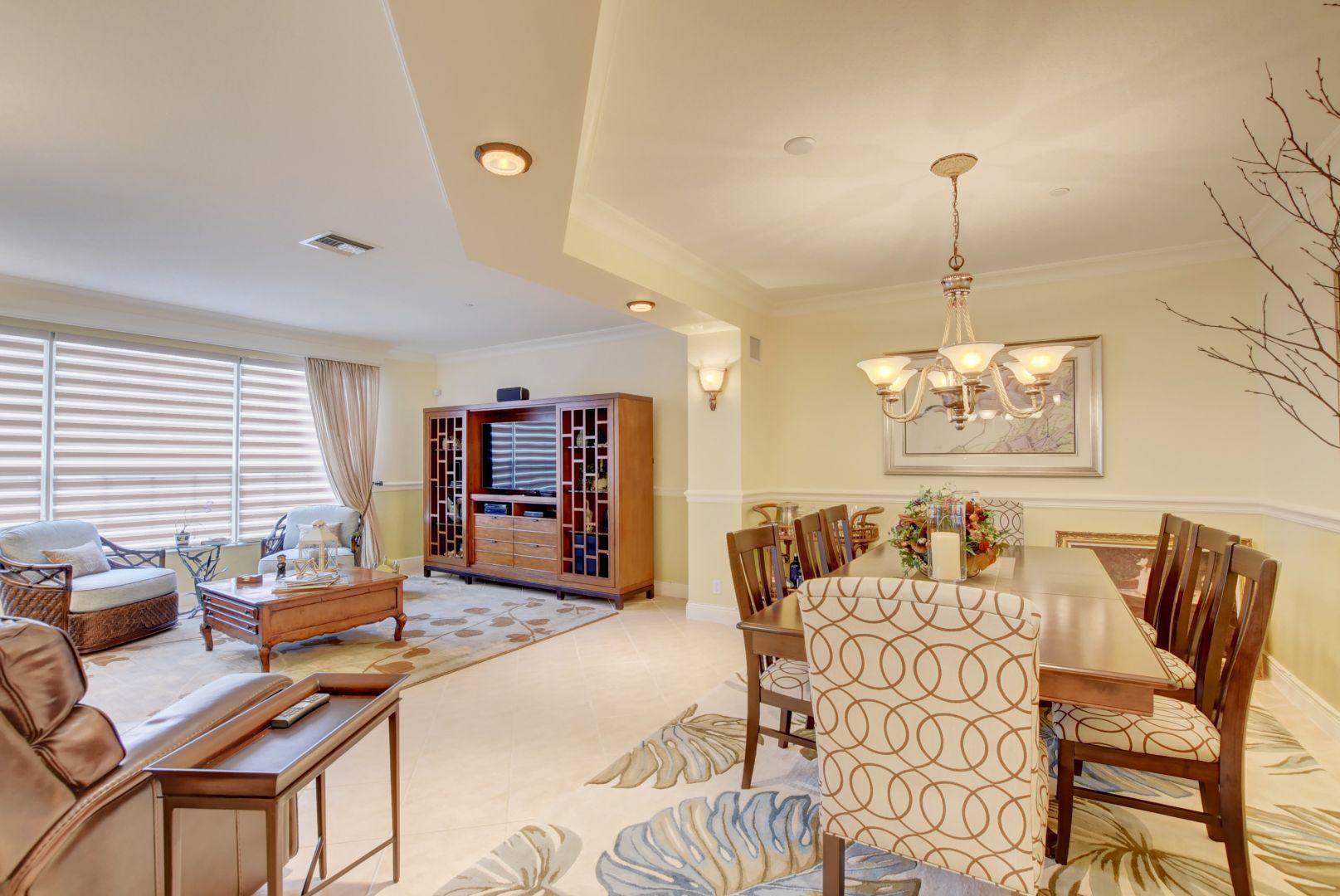 5530 Northeast Trieste Way Boca Raton, FL 33487 - Photo 11 of 56 a living room with furniture and window