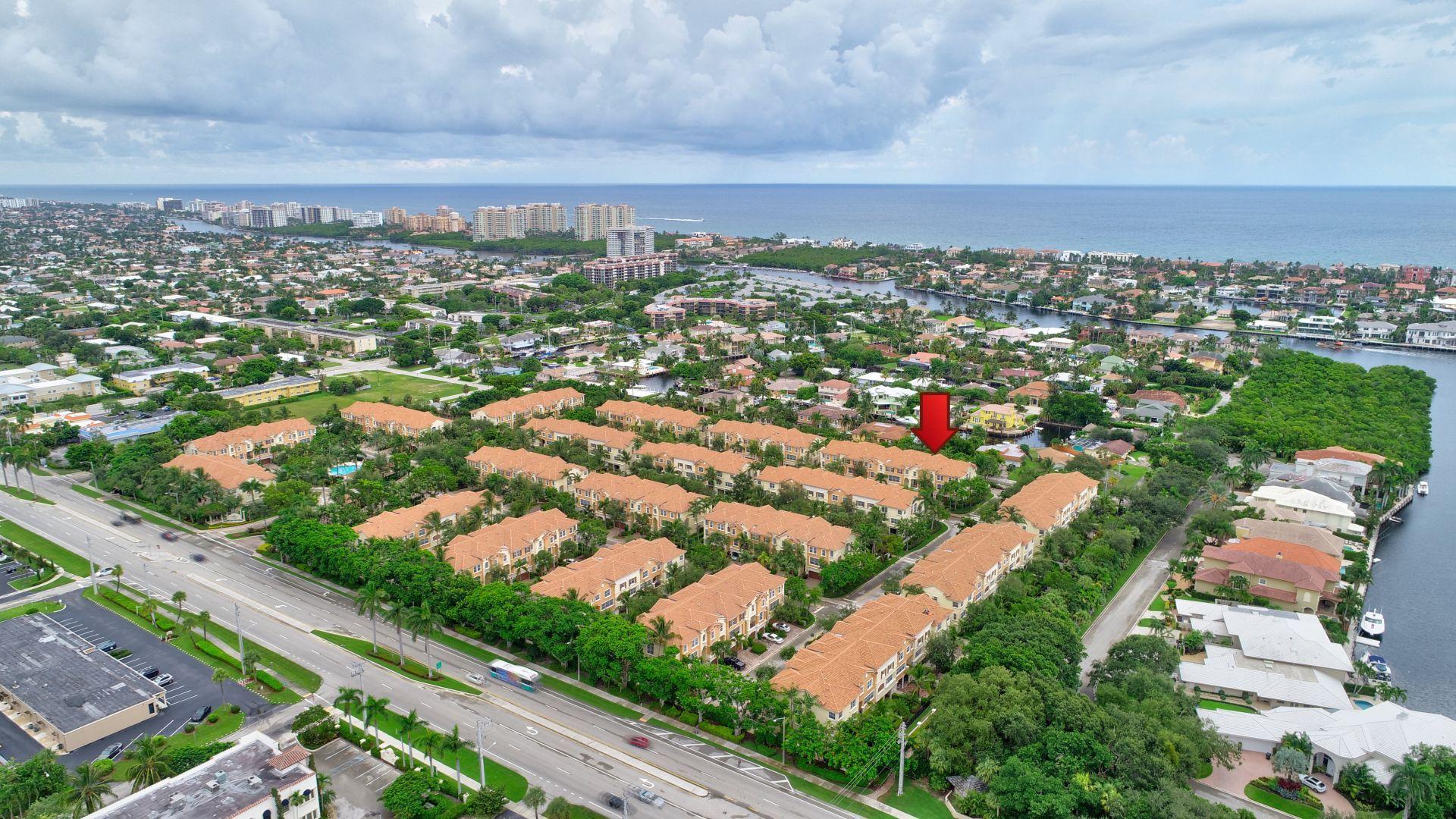 5530 Northeast Trieste Way Boca Raton, FL 33487 - Photo 49 of 56 an aerial view of multiple house