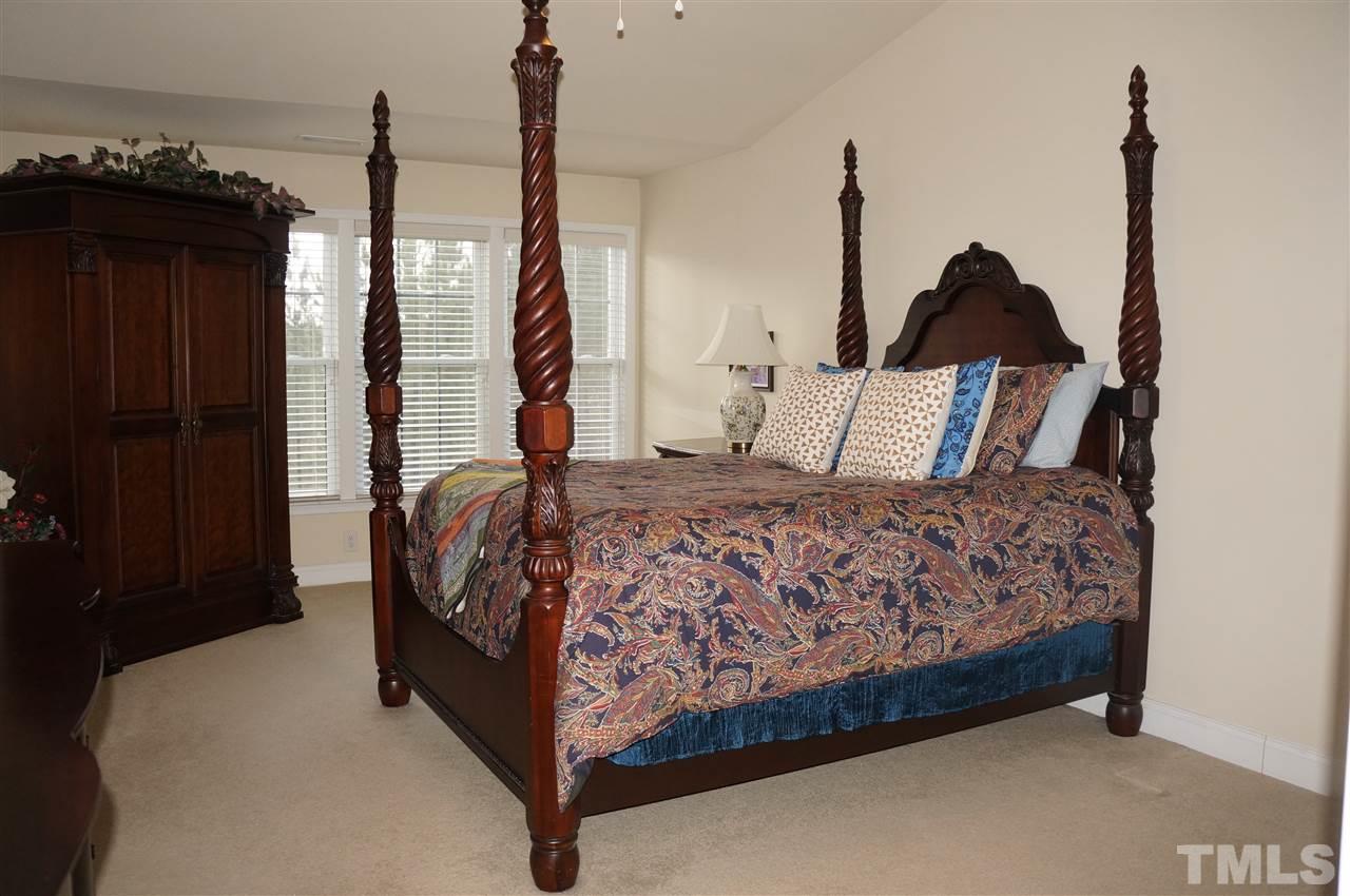 10913 Clovermill Circle Raleigh, NC 27617 - Photo 12 of 25 Huge master bedroom with cathedral ceiling, ceiling fan and great space for the largest of bedroom sets!
