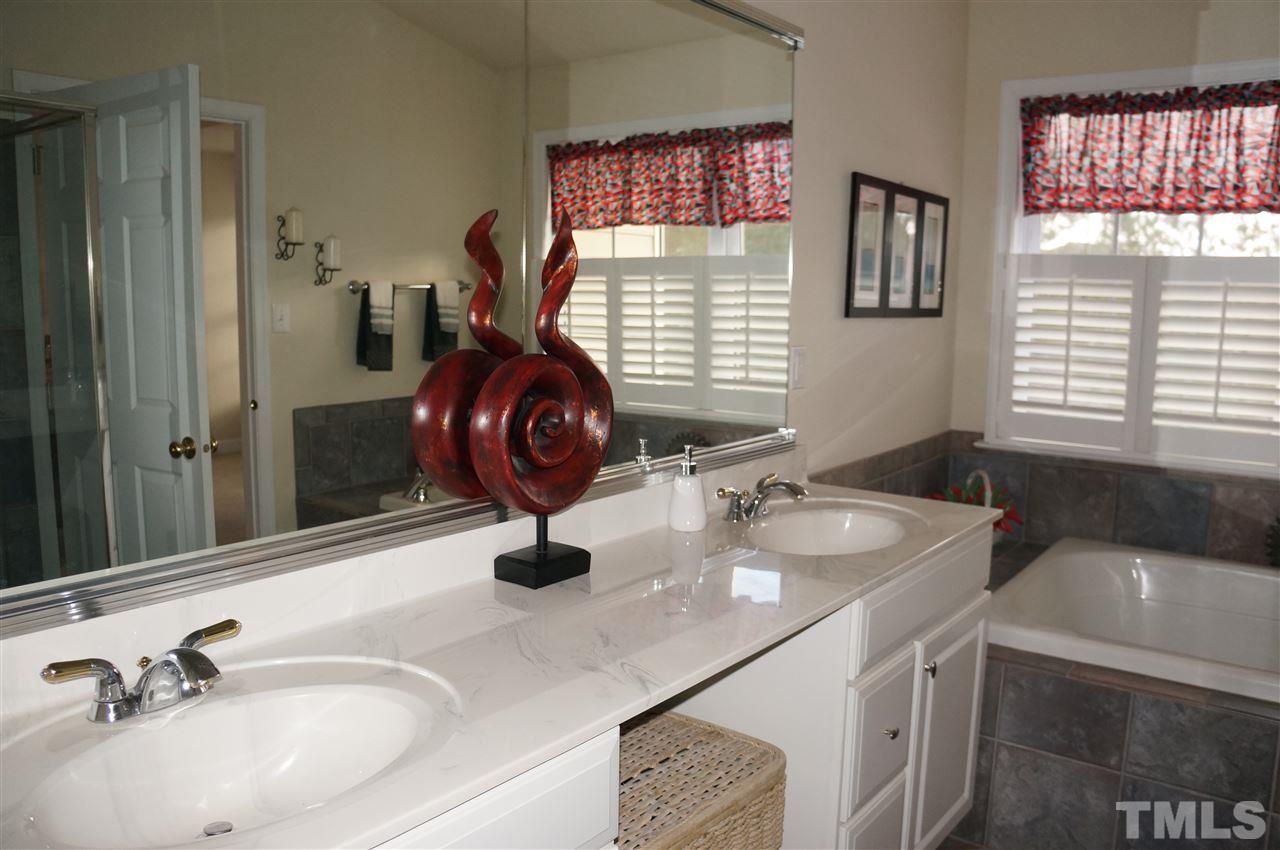 10913 Clovermill Circle Raleigh, NC 27617 - Photo 13 of 25 Double 39" vanity, lovely fixtures, seperate shower & tub.